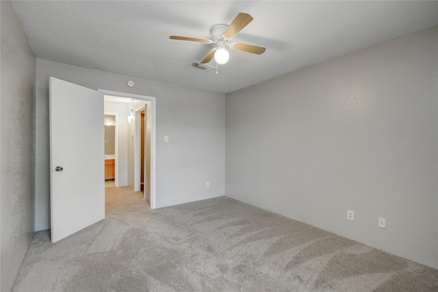 9700 Leawood Blvd Unit 7/16, Houston, TX 77099 - empty room with light colored carpet and ceiling fan