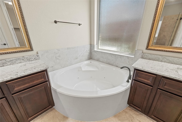 6015 Verde Place Ln, Katy, TX 77493 - full bathroom featuring a jetted tub, vanity, and tile patterned floors