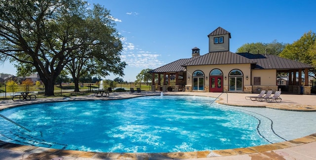 6015 Verde Place Ln, Katy, TX 77493 - community pool featuring a patio