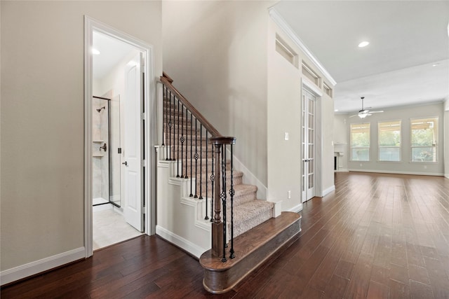 6015 Verde Place Ln, Katy, TX 77493 - stairs featuring a ceiling fan, wood-type flooring, recessed lighting, and baseboards