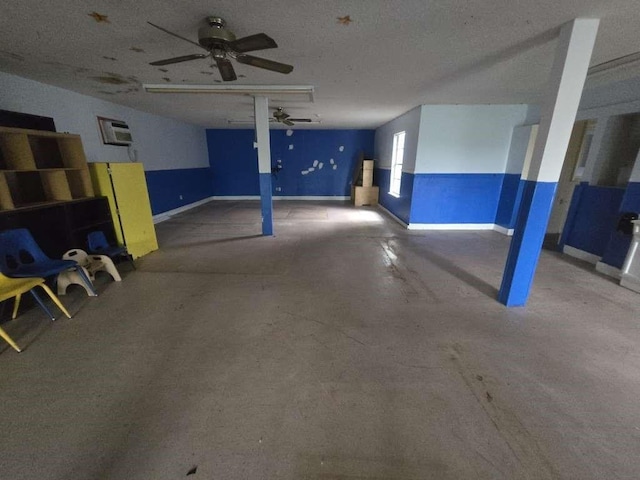 830 Stonyridge St, Channelview, TX 77530 - garage featuring a ceiling fan and baseboards
