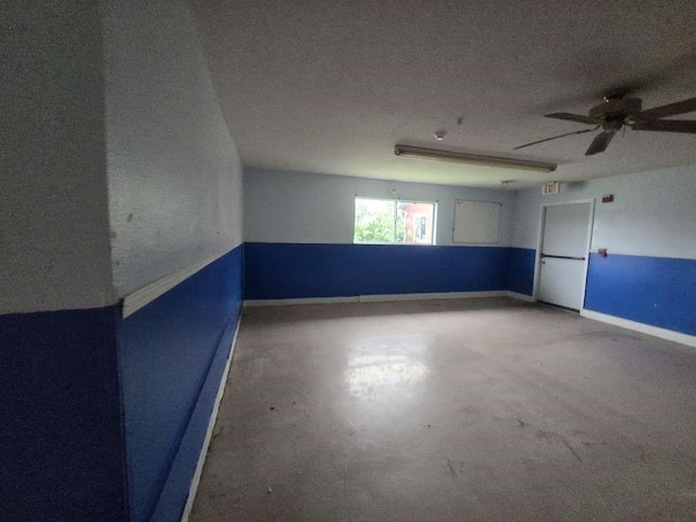 830 Stonyridge St, Channelview, TX 77530 - empty room featuring a ceiling fan, baseboards, and concrete floors