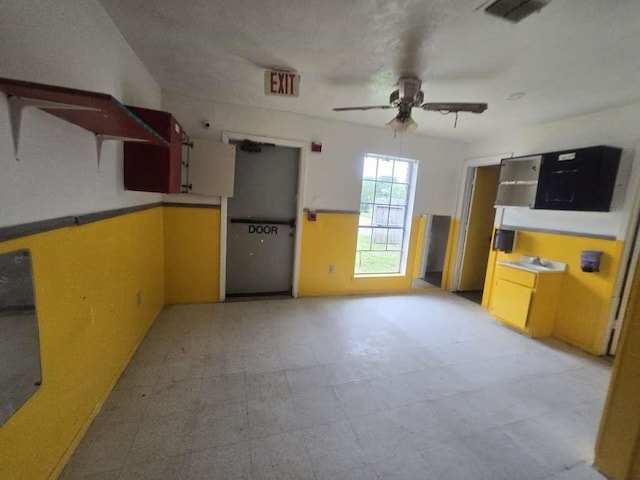 830 Stonyridge St, Channelview, TX 77530 - unfurnished living room with a ceiling fan and light flooring