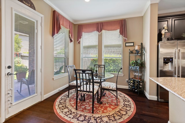 24119 Blue Crest Dr, Porter, TX 77365 - dining room with crown molding, dark wood-style floors, and baseboards