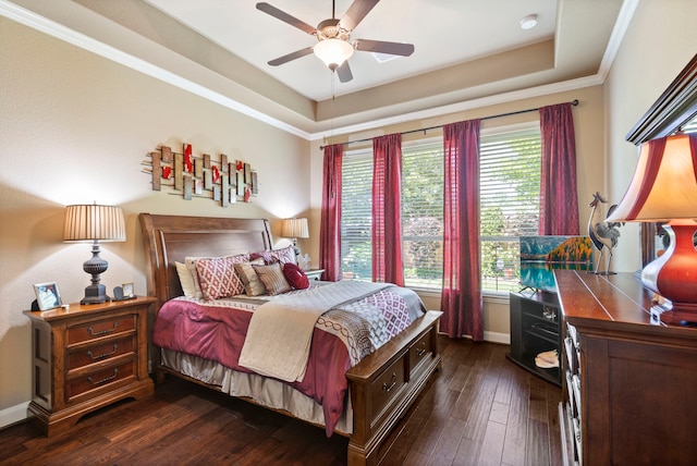 24119 Blue Crest Dr, Porter, TX 77365 - bedroom featuring a raised ceiling, dark wood-style flooring, crown molding, baseboards, and ceiling fan