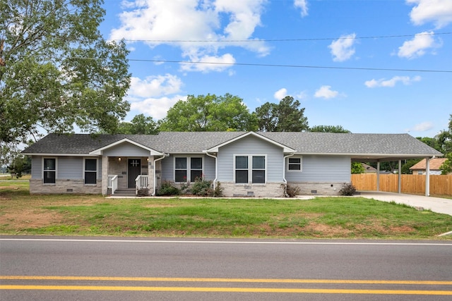 809 E Bowie Ave, Crockett, TX 75835 - single story home with crawl space, an attached carport, concrete driveway, and a shingled roof