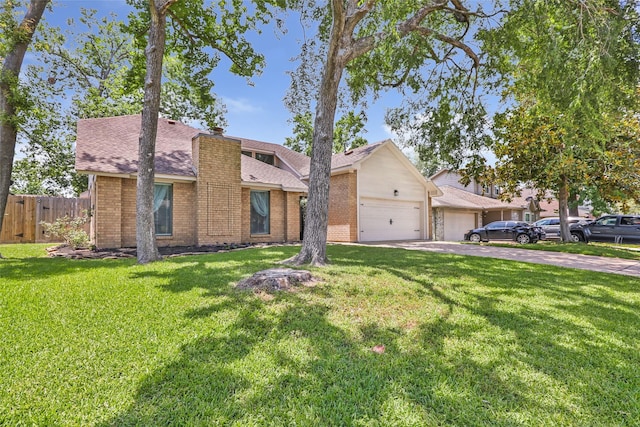 19011 Sandia Pines Dr, Humble, TX 77346 - mid-century home featuring brick siding, driveway, a garage, and a chimney