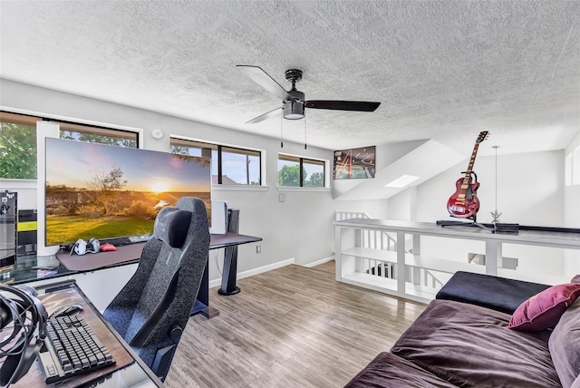 19011 Sandia Pines Dr, Humble, TX 77346 - office space with a textured ceiling, wood finished floors, baseboards, and a ceiling fan