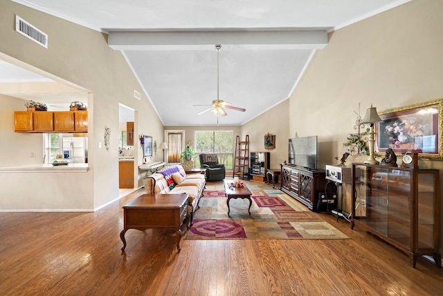 907 S Peach Hollow Ct, Pearland, TX 77584 - living room with wood finished floors, a ceiling fan, beam ceiling, high vaulted ceiling, and baseboards