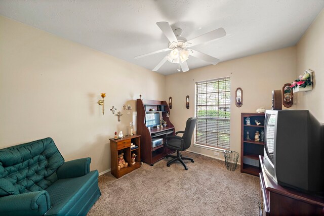 907 S Peach Hollow Ct, Pearland, TX 77584 - carpeted home office featuring a ceiling fan and baseboards