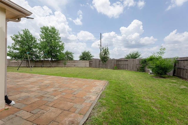 20511 Noble Ranch Ct, Richmond, TX 77407 - view of yard featuring a patio area and a playground