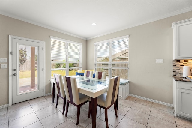 20511 Noble Ranch Ct, Richmond, TX 77407 - dining room featuring ornamental molding, baseboards, and light tile patterned floors