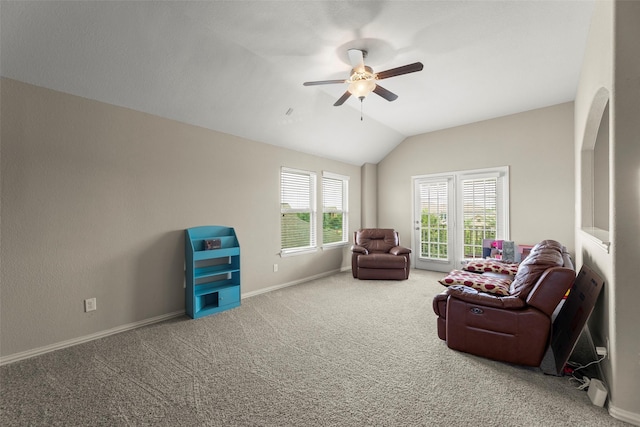 20511 Noble Ranch Ct, Richmond, TX 77407 - living area featuring ceiling fan, lofted ceiling, carpet flooring, and baseboards