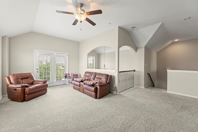20511 Noble Ranch Ct, Richmond, TX 77407 - carpeted living area with vaulted ceiling, a ceiling fan, and baseboards