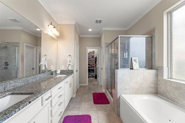 20511 Noble Ranch Ct, Richmond, TX 77407 - bathroom featuring a shower stall, double vanity, a garden tub, a spacious closet, and recessed lighting