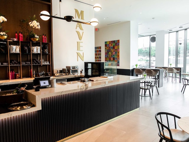 1711 Allen Pkwy Unit 3401, Houston, TX 77019 - kitchen featuring expansive windows and tile patterned flooring