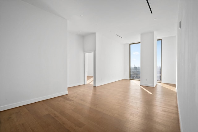 1711 Allen Pkwy Unit 3401, Houston, TX 77019 - empty room with wood finished floors and baseboards