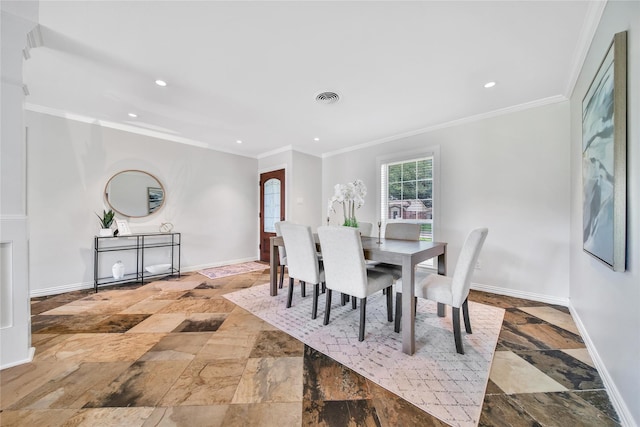 1146 Chamboard Ln, Houston, TX 77018 - dining space featuring stone tile flooring, ornamental molding, recessed lighting, and baseboards