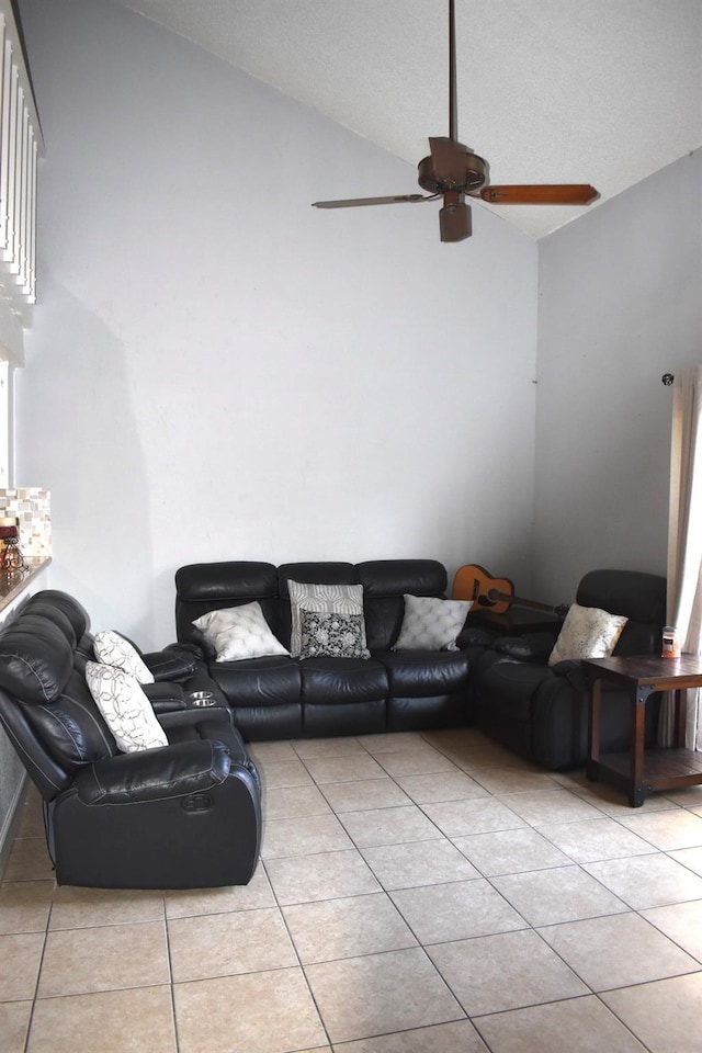 12605 Wellington Park Dr Unit 17, Houston, TX 77072 - tiled living room featuring ceiling fan and high vaulted ceiling
