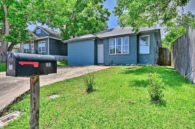 213 N Austin St, Brenham, TX 77833 - view of front of property with metal roof