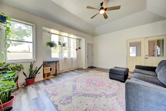 213 N Austin St, Brenham, TX 77833 - living area featuring plenty of natural light, a ceiling fan, wood finished floors, baseboards, and lofted ceiling