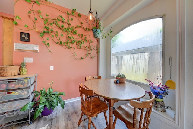 213 N Austin St, Brenham, TX 77833 - dining space with wood finished floors and baseboards