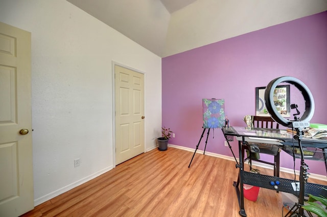 213 N Austin St, Brenham, TX 77833 - office with light wood-style flooring, baseboards, and vaulted ceiling