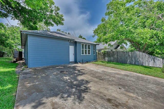213 N Austin St, Brenham, TX 77833 - view of front of house with metal roof