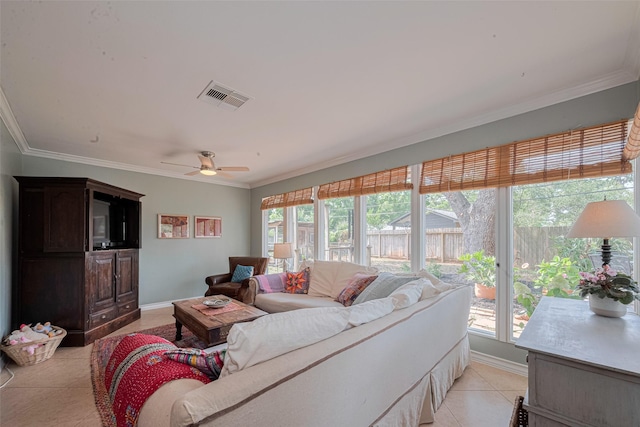 10318 Raritan Dr, Houston, TX 77043 - living room featuring light tile patterned flooring, ornamental molding, a ceiling fan, and baseboards