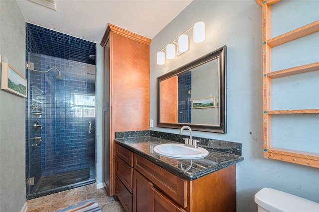 10318 Raritan Dr, Houston, TX 77043 - full bathroom with a stall shower, vanity, toilet, and tile patterned flooring