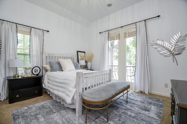 866 Myrtlea Ln, Houston, TX 77079 - bedroom with carpet floors, access to exterior, and vaulted ceiling