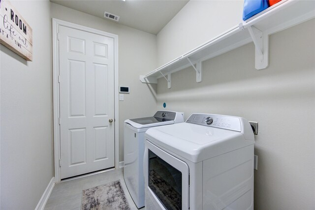2432 Solaris Bend Dr, Katy, TX 77493 - washroom with independent washer and dryer and baseboards