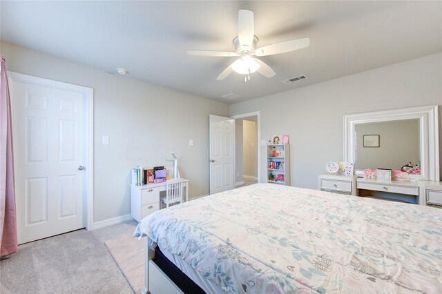 2432 Solaris Bend Dr, Katy, TX 77493 - bedroom featuring light carpet, a ceiling fan, and baseboards