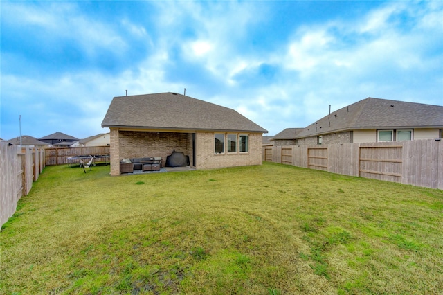 2432 Solaris Bend Dr, Katy, TX 77493 - back of house featuring outdoor lounge area and brick siding
