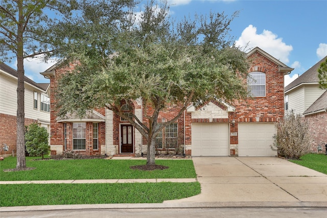 714 Stubbs Bend Dr, Rosenberg, TX 77469 - view of property hidden behind natural elements featuring concrete driveway, a front yard, brick siding, and a garage