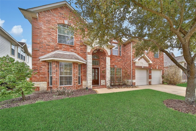 714 Stubbs Bend Dr, Rosenberg, TX 77469 - traditional home with brick siding, driveway, and a front lawn