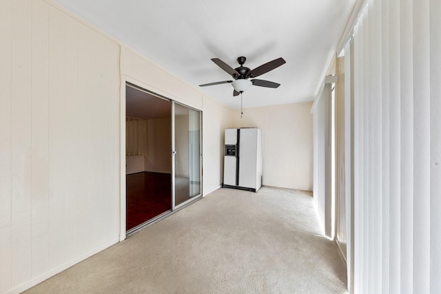 12633 Memorial Dr Unit 170, Houston, TX 77024 - unfurnished room featuring ceiling fan and light carpet
