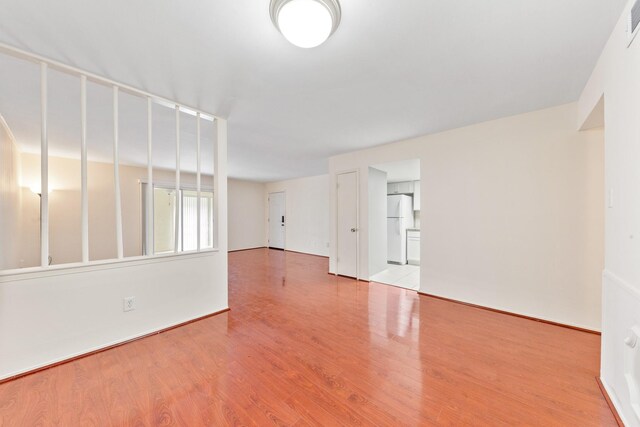 12633 Memorial Dr Unit 170, Houston, TX 77024 - spare room with wood finished floors