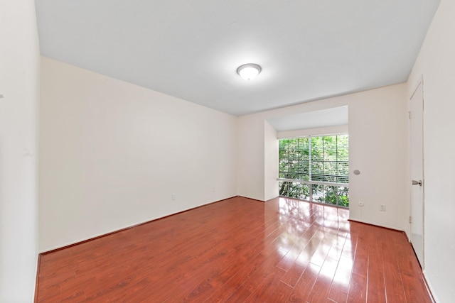 12633 Memorial Dr Unit 170, Houston, TX 77024 - unfurnished room featuring wood finished floors and baseboards