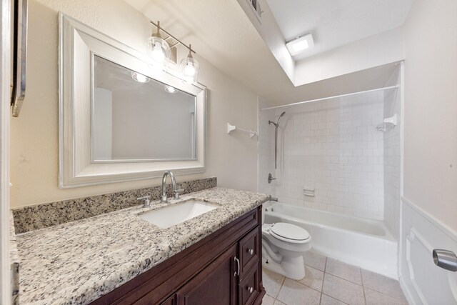 12633 Memorial Dr Unit 170, Houston, TX 77024 - full bathroom featuring toilet, vanity, shower / tub combination, and tile patterned flooring