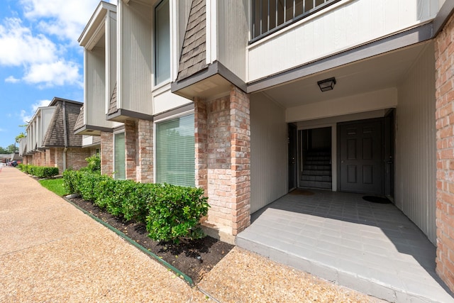 12633 Memorial Dr Unit 170, Houston, TX 77024 - entrance to property with brick siding