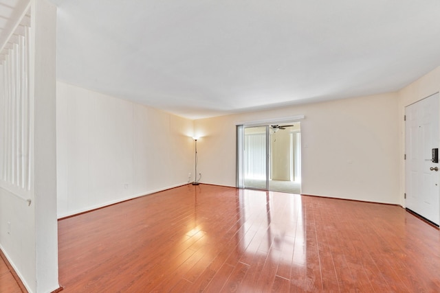 12633 Memorial Dr Unit 170, Houston, TX 77024 - spare room with wood finished floors and baseboards
