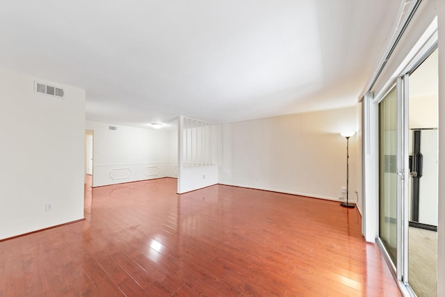 12633 Memorial Dr Unit 170, Houston, TX 77024 - spare room with wood finished floors