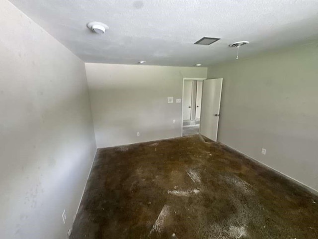426 Pennington Dr, Corpus Christi, TX 78412 - empty room featuring concrete floors and a smoke detector