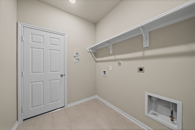 27506 Beachside Arbor Dr, Katy, TX 77493 - laundry area with electric dryer hookup, washer hookup, baseboards, and gas dryer hookup