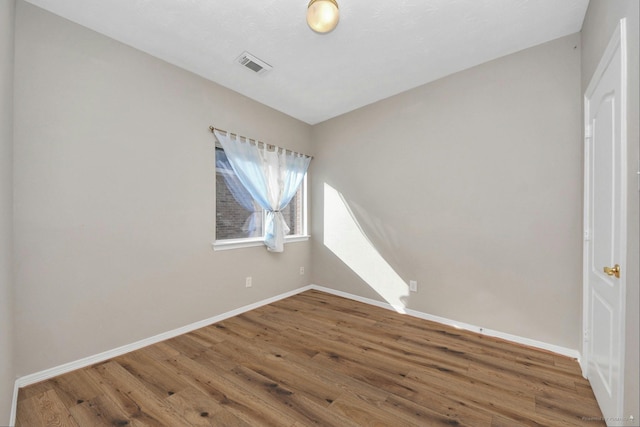2202 Donrel Way, Houston, TX 77067 - empty room featuring wood finished floors and baseboards