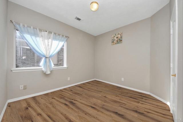 2202 Donrel Way, Houston, TX 77067 - unfurnished room featuring wood finished floors and baseboards