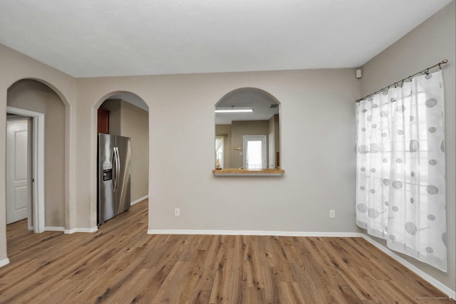 2202 Donrel Way, Houston, TX 77067 - empty room with wood finished floors and baseboards