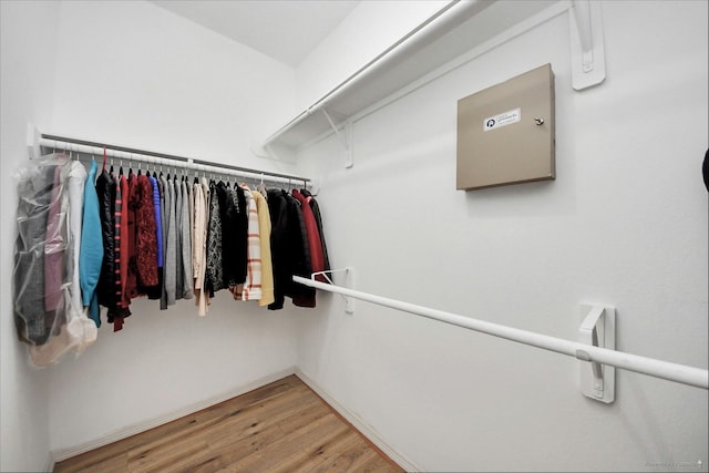 2202 Donrel Way, Houston, TX 77067 - walk in closet featuring wood finished floors