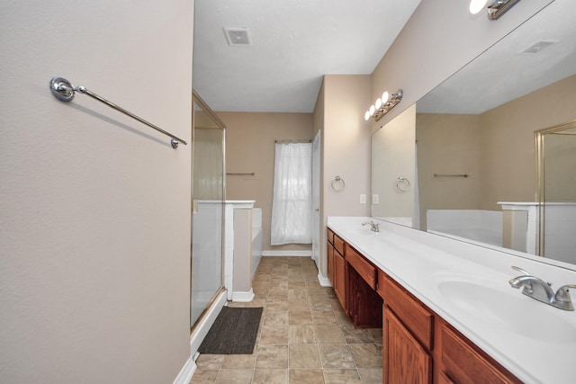 2202 Donrel Way, Houston, TX 77067 - bathroom with a stall shower, double vanity, baseboards, and a bath